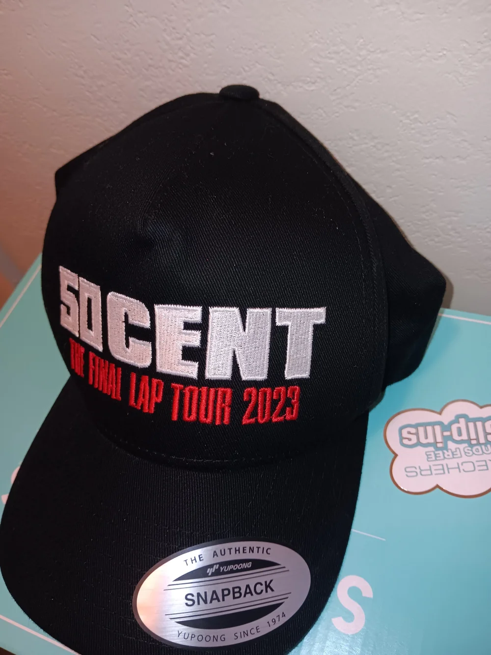 The Classic Black Snapback Hat with White and Red Embroidery